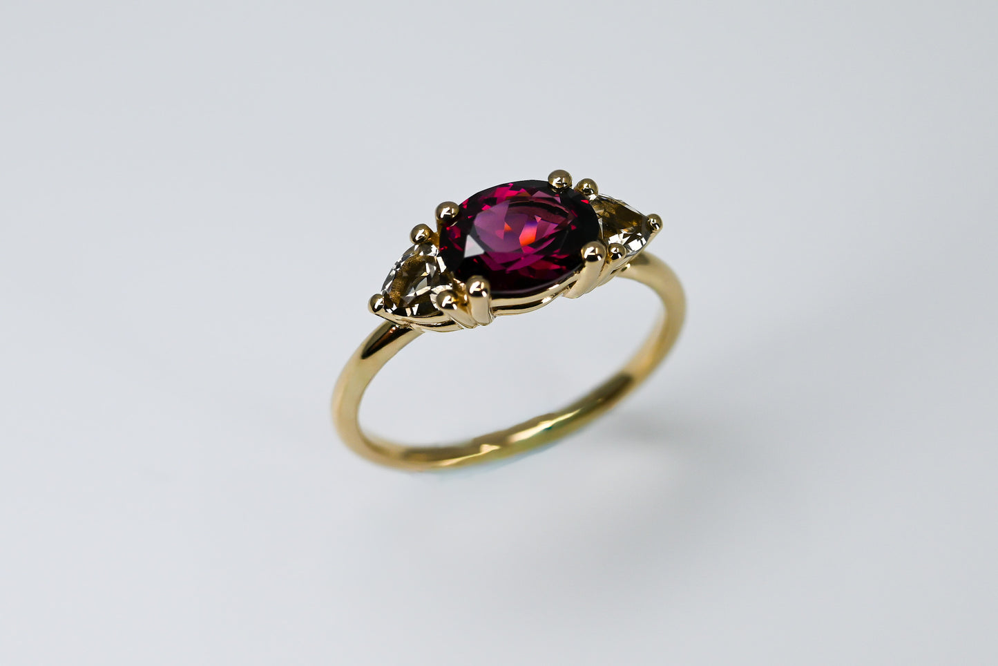 Garnet and smoky quartz trilogy ring