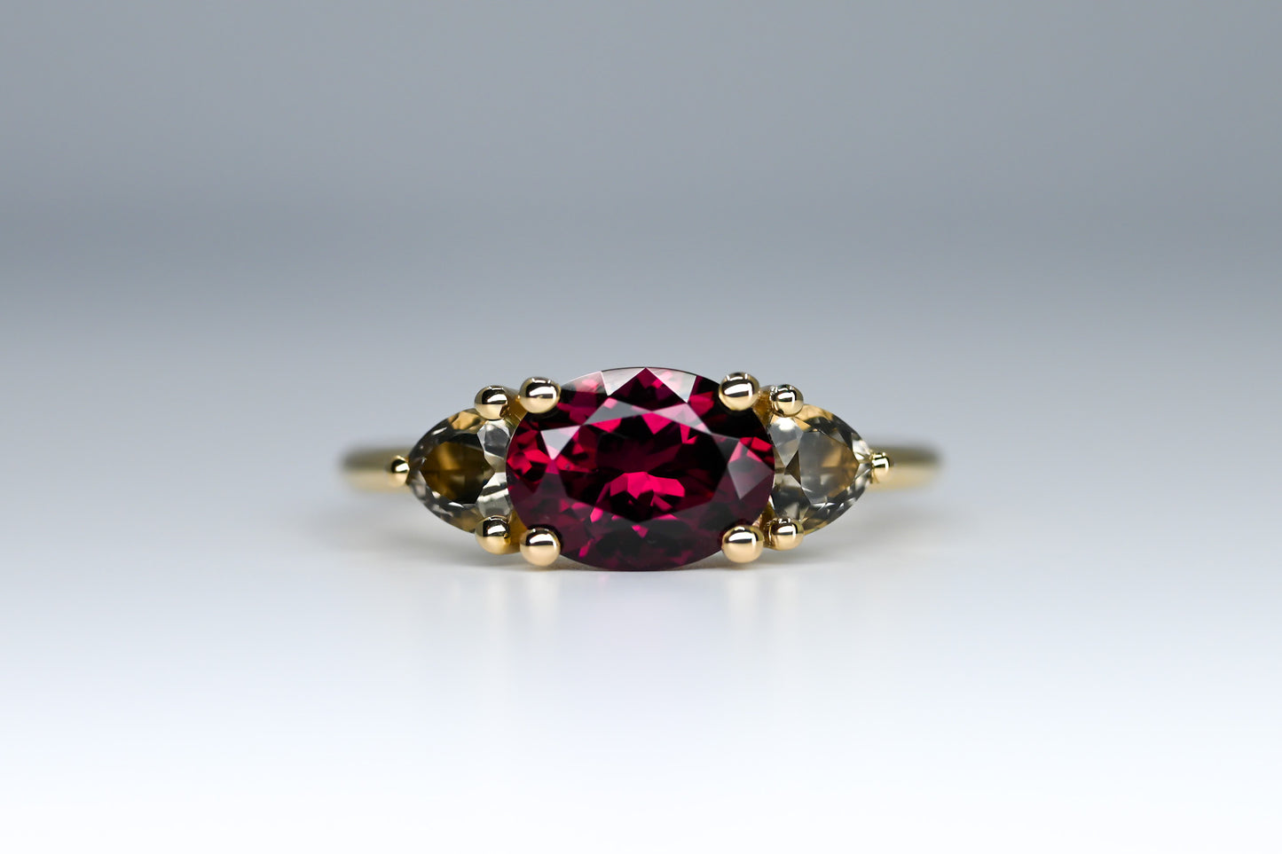 Garnet and smoky quartz trilogy ring